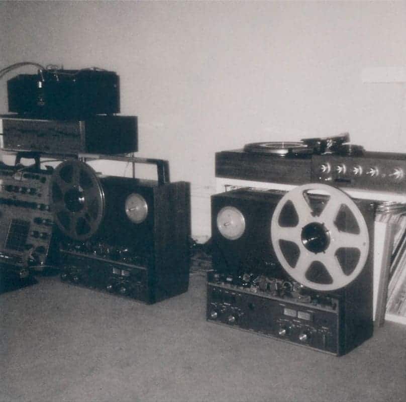 Two reel-to-reel tape machines side-by-side.